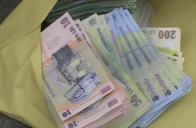 Salariul minim pe economie creste la 1450 de lei de la 1 februarie