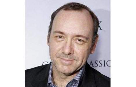 Kevin Spacey, decorat de regina Elisabeta a II-a