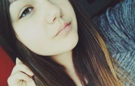 O fata de 15 ani a cazut de pe bloc in timp ce-si facea un selfie