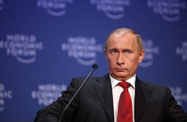 Putin le cere rusilor ajutor ca sa-si boteze catelul