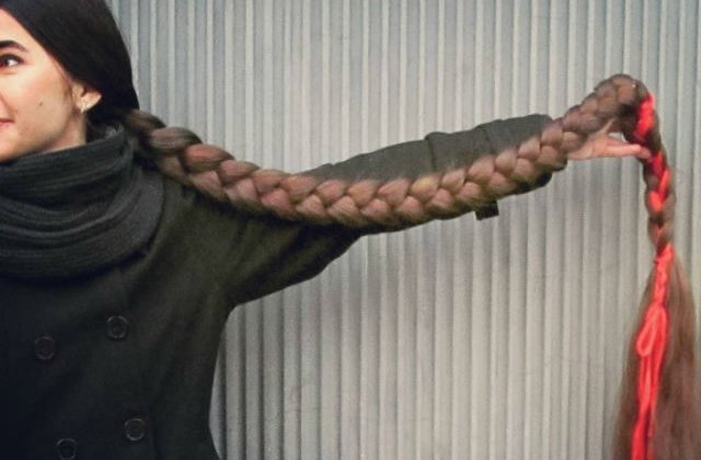 [FOTO] Rapunzel exista! Aceasta tanara are cel mai lung par pe care l-ai vazut vreodata