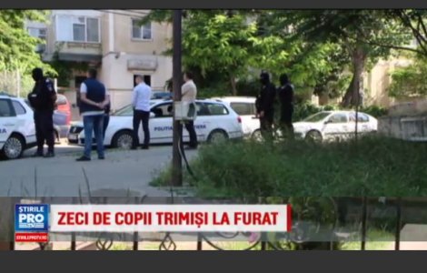 Perchezitii in peste 70 de locuinte din tara. Copii folositi la cersit