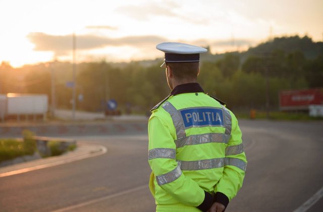 Un politist a fost agresat dupa ce a oprit in trafic un camion incarcat cu lemne