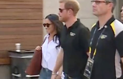 Printul Harry si iubita sa Meghan Markle au fost vazuti pentru prima data tinandu-se de mana / VIDEO