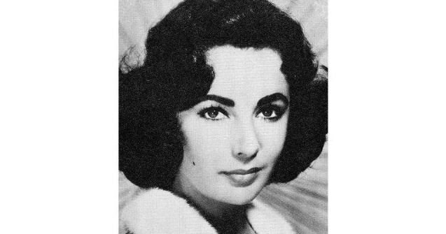 Elizabeth Taylor, inmormantata, in lux, langa Michael Jackson