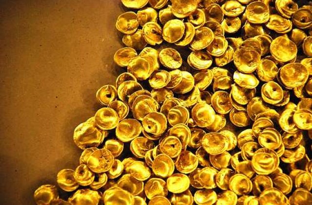 Aurul doboara record dupa record