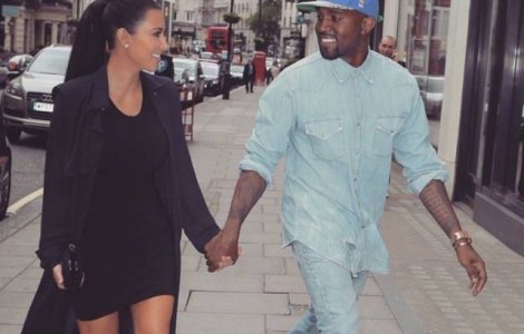 Kim Kardashian si Kanye West au anuntat nasterea celui de-al treilea copil