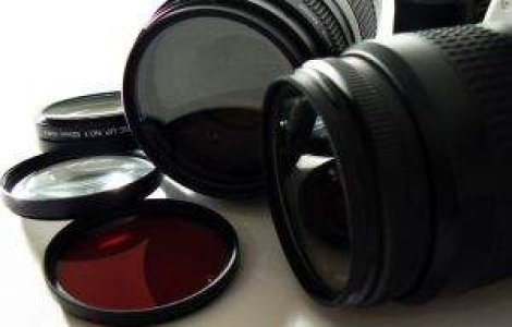 Canon, profit in scadere cu 20% in T2