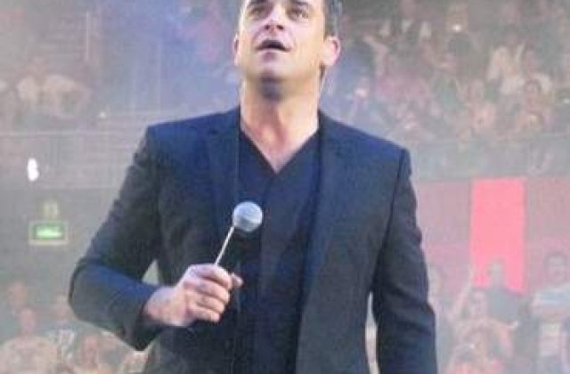 Pentru cati bani ar face Robbie Williams sex cu un barbat?
