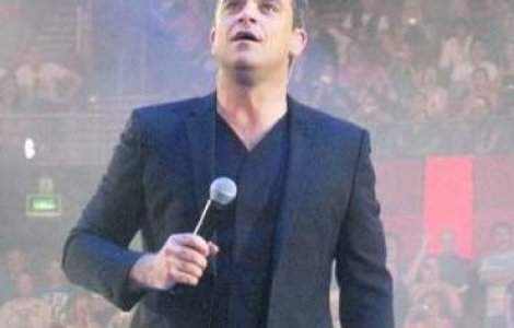 Pentru cati bani ar face Robbie Williams sex cu un barbat?