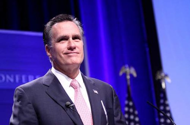 Mitt Romney a castigat in alegerile din Iowa la o diferenta minuscula