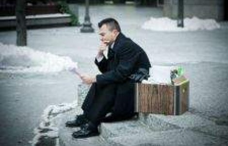 O treime din romani, afectati direct de criza