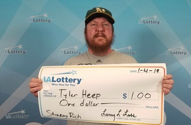 Un barbat a cerut loteriei sa ii scrie un cec urias pentru doar un dolar castigat