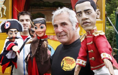 Obama joaca la teatrul de papusi francez