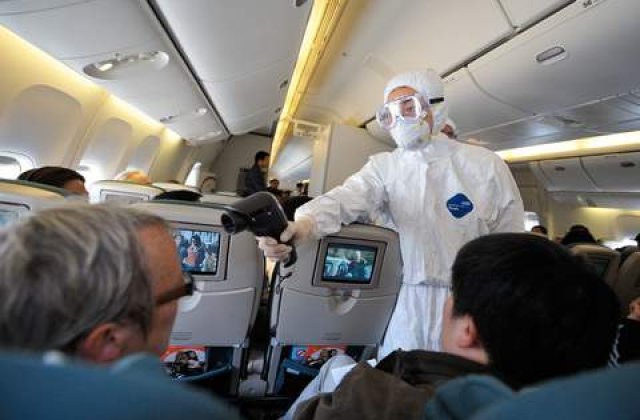 Scenariu soc: Pana la 100.000 de noi cazuri de gripa porcina inregistrate zilnic in M. Britanie