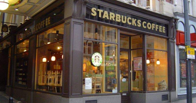 Starbucks se ofera sa plateasca taxe de 20 milioane de lire in Marea Britanie