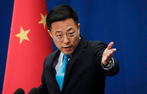 Oficial chinez: virusul din Wuhan ar fi putut fi adus de armata SUA