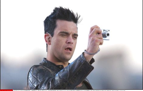 Robbie Williams revine in forta