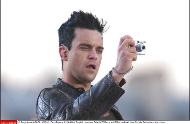 Robbie Williams revine in forta
