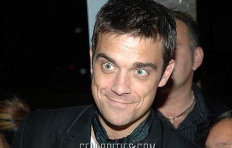 Robbie Williams, speriat de gripa porcina