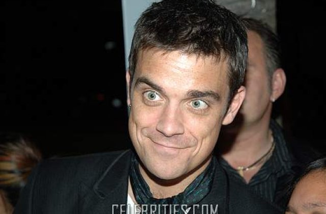 Robbie Williams, speriat de gripa porcina