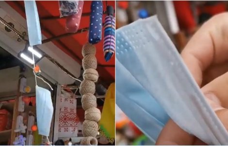 VIDEO Nepăsarea vânzătorilor: Măști de protecție atârnate pe sfoară în Piața Obor