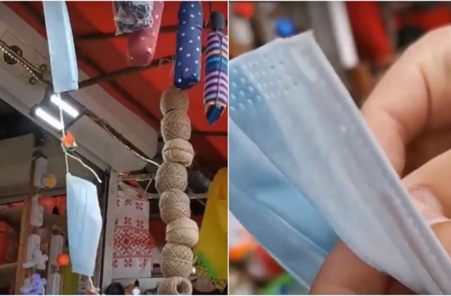 VIDEO Nepăsarea vânzătorilor: Măști de protecție atârnate pe sfoară în Piața Obor