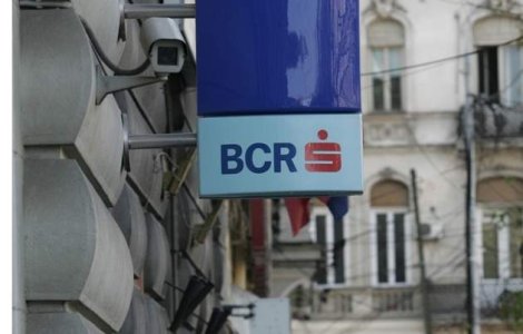 BCR va taxa persoanele care isi platesc facturile la ghiseele bancii