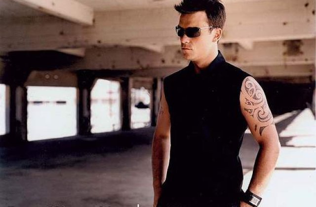 Robbie Williams asteapta musafiri extraterestrii