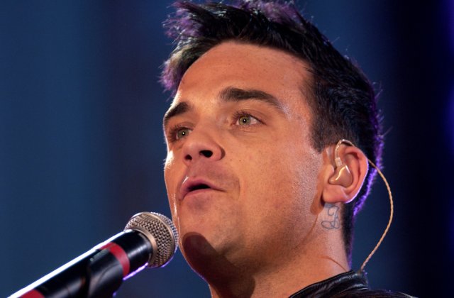 Robbie Williams și-a dezvălui secretul: „Îmi place să urinez în piscinele altora. Așa îmi marchez teritoriul”