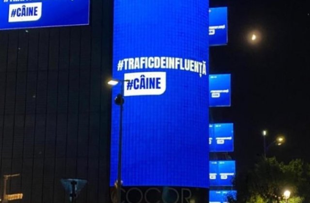Lovitură pentru Nicușor Dan! În centrul Bucureștiului a apărut o reclamă cu „#trafic de influență” și „#câine”