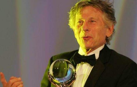 Hartuita de jurnalisti, victima lui Polanski cere justitiei achitarea regizorului
