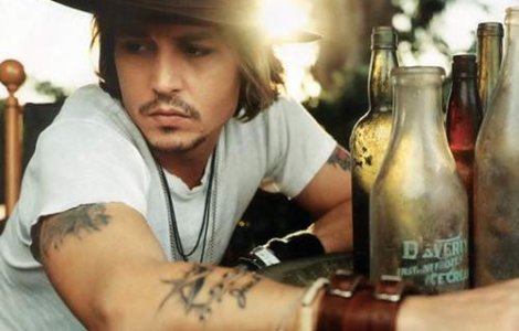 Johnny Depp il salveaza pe Nicolas Cage de la faliment