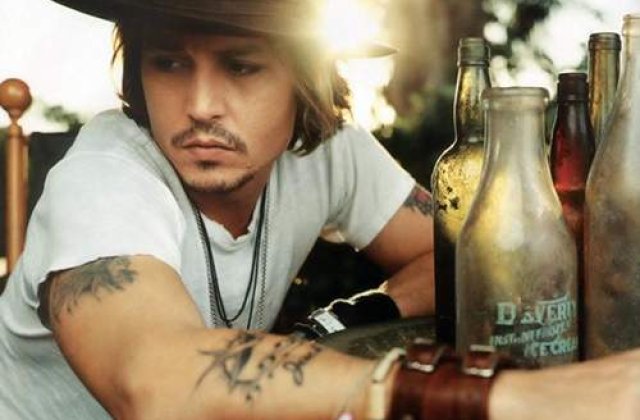 Johnny Depp il salveaza pe Nicolas Cage de la faliment