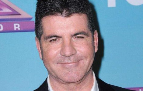 Simon Cowell va avea un copil... cu sotia celui mai bun prieten