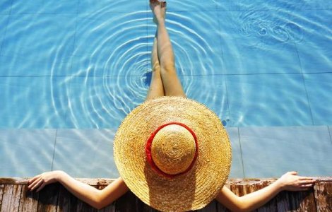 Femeile poarta doar o treime din hainele pe care le iau in concediu