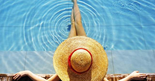 Femeile poarta doar o treime din hainele pe care le iau in concediu