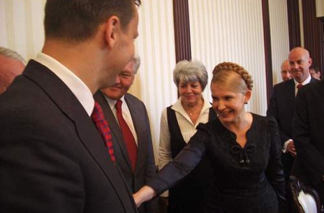 Ianukovici ii cere Iuliei Timosenko demisia