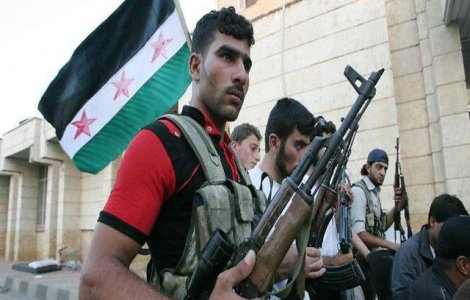 Rebelii sirieni au luat cu asalt inchisoarea centrala din Alep