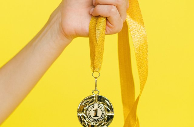 O sportivă premiată la Jocurile Olimpice și-a scos la licitație medalia pentru a ajuta un copil bolnav