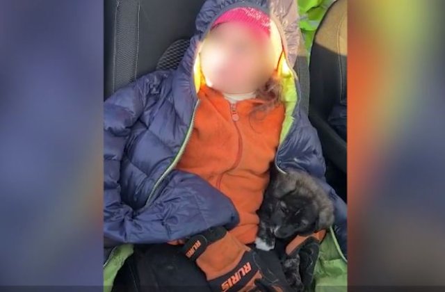 Fetiță de 9 ani din Dolj, găsită după o noapte, &icirc;n hipotermie, cu un cățeluș l&acirc;ngă ea. &bdquo;Nu o certați, lăsați-o!&rdquo;
