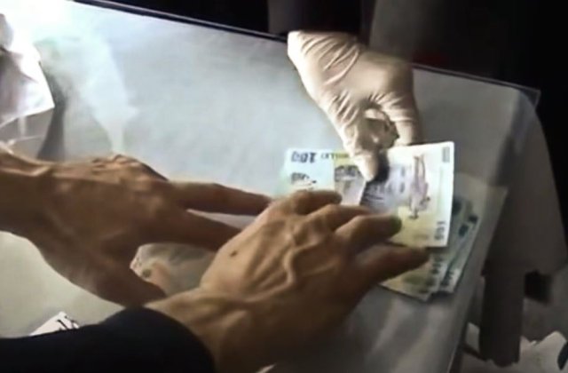 Cardiologul din Brașov prins când lua 8.000 de lei șpagă se apără. Atât ar fi costat consultul 