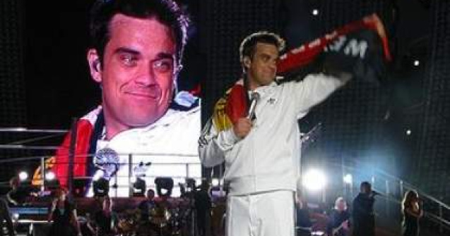 Robbie Williams vrea sa adopte doi copii din Haiti