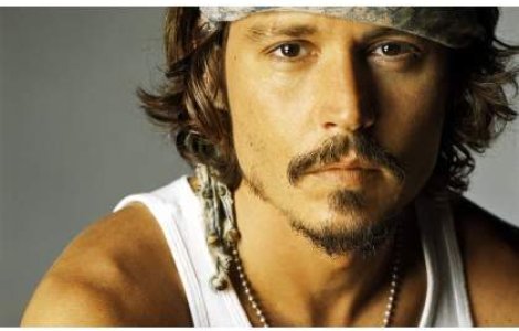 Johnny Depp s-a logodit cu Amber Heard