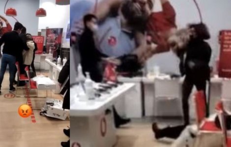 VIDEO Femeie împinsă brutal de un angajat al Vodafone, de față cu fiica ei. Reacția companiei