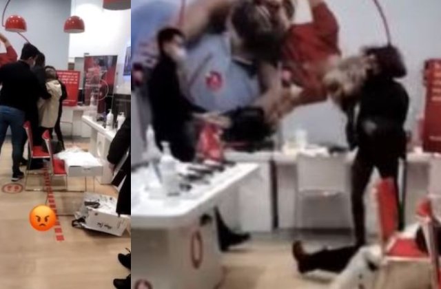 VIDEO Femeie &icirc;mpinsă brutal de un angajat al Vodafone, de față cu fiica ei. Reacția companiei 