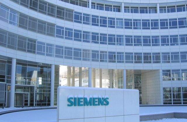 Siemens va elimina cel putin 11.600 de locuri de munca
