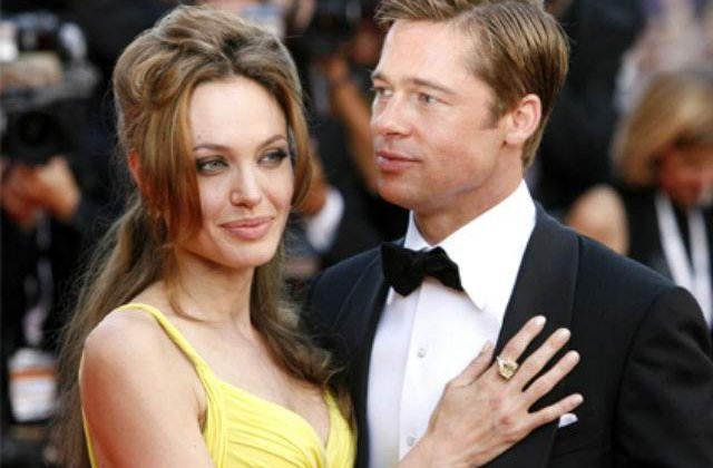 Cat au primit Angelina Jolie si Brad Pitt pentru fotografiile de la nunta