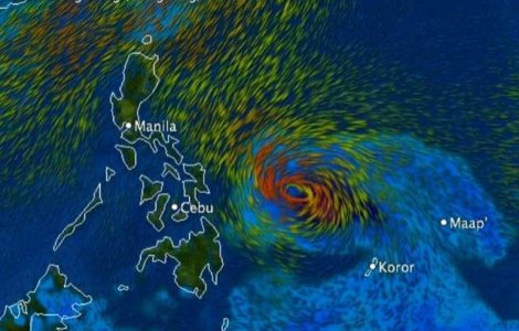 Mii de filipinezi se refugiaza din calea taifunului Hagupit