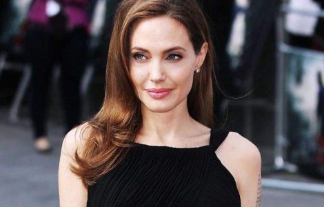 Angelina Jolie: Copiii mei vor deja sa isi faca tatuaje